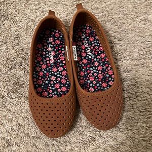 Children’s brown flats.